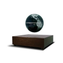 Globe terrestre en lévitation magnétique flotte sur un support en bois